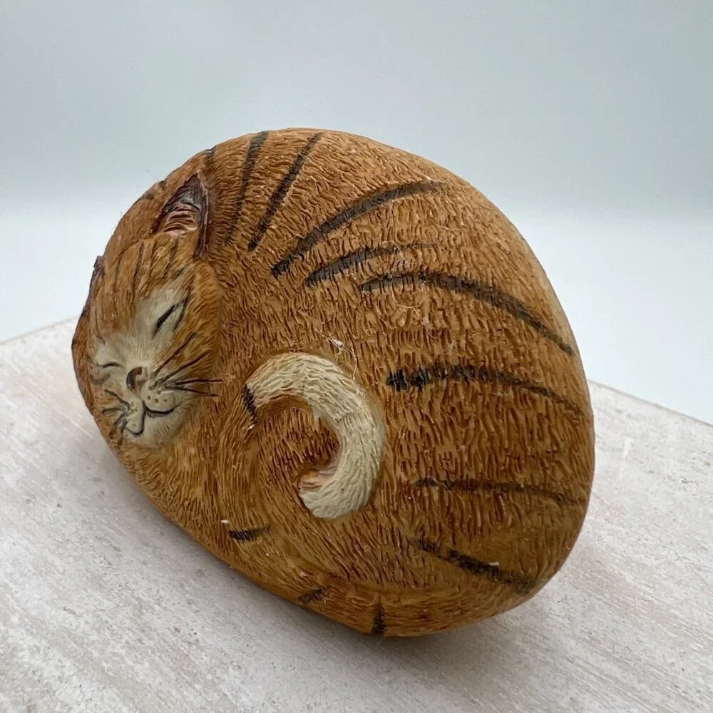 Ginger cat resin figurine looks like a rock paint